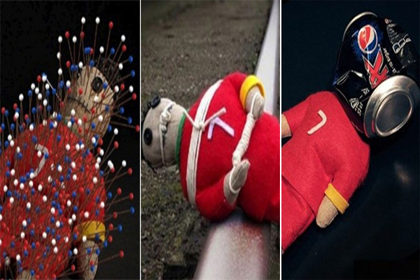 صورة للدمى الثلاثة التي رمزت لرونالدو بقميص منتخب بلاده