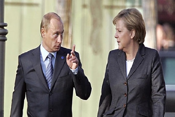 بوتين وميركل