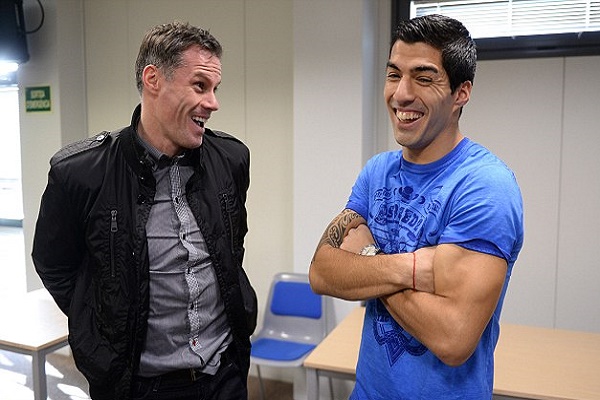  النجم الأوروغوائي لويس سواريز رفقة زميله السابق في ليفربول جيمي كاراجر