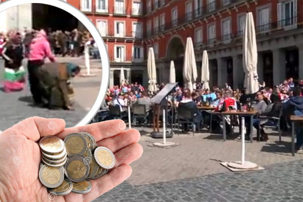جماهير ايندهوفن ترمى نقود أرضاً على متسولين في مدريد