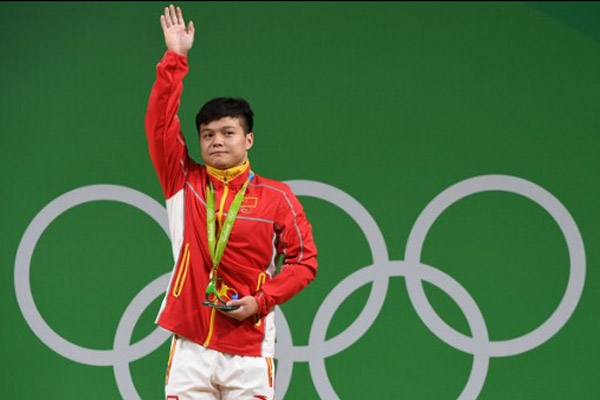 الرباع الصيني كينغ كوان لونغ يحقق رقما قياسيا ويحرز ذهبية وزن 56 كلغ