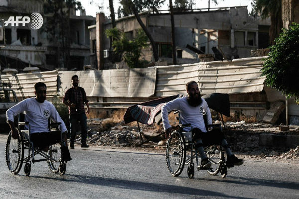 مصابون في الحرب السورية يشاركون في سباق بارالمبي