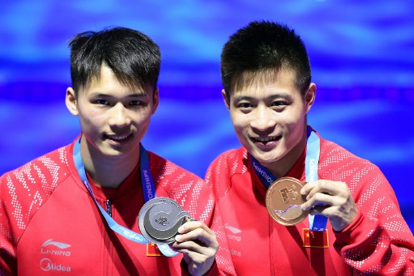 انهت الصين منافسات الغطس في بطولة العالم للسباحة بذهبية ثامنة عبر وانغ هان ولي جينغ 