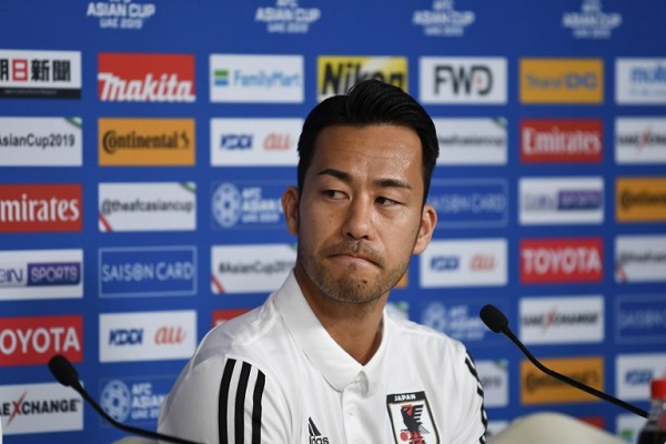يوشيدا يدعو لاعبي اليابان إلى التأقلم مع الضغوط