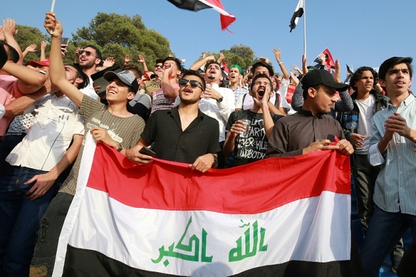 مشجعو منتخب العراق خلال مبارات العراق وإيران في العاصمة الأردنية عمان