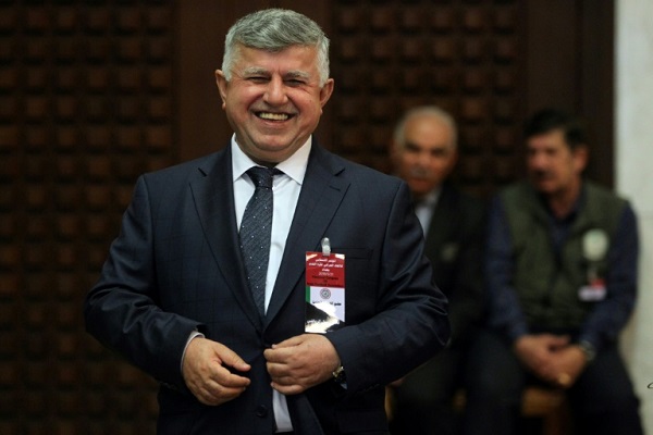 عبد الخالق مسعود بعد إعادة انتخابه رئيسا للاتحاد العراقي لكرة القدم، في 31 أيار/مايو 2018.