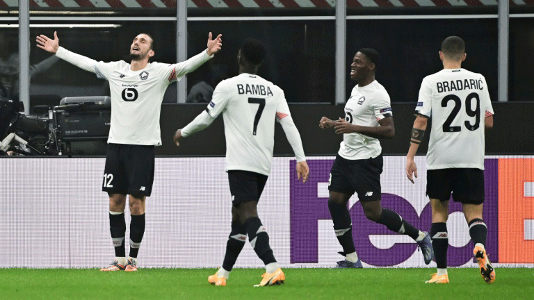 لاعب ليل الفرنسي التركي يوسف يازيجي يحتفل بأحد أهدافه الثلاثة بمرمى ميلان الإيطالي ضمن منافسات الجولة الثالثة من الدوري الأوروبي (يوروبا ليغ) في 5 تشرين الثاني/نوفمبر 2020