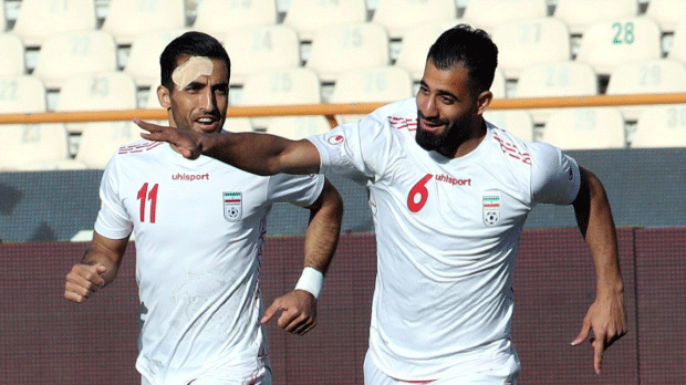 مهاجم ايران حسين كنعاني زاديغان يحتفل بافتتاحه التسجيل في مرمى سوريا (3-صفر) في مباراة دولية ودية في طهران في 30 آذار/مارس 2021.