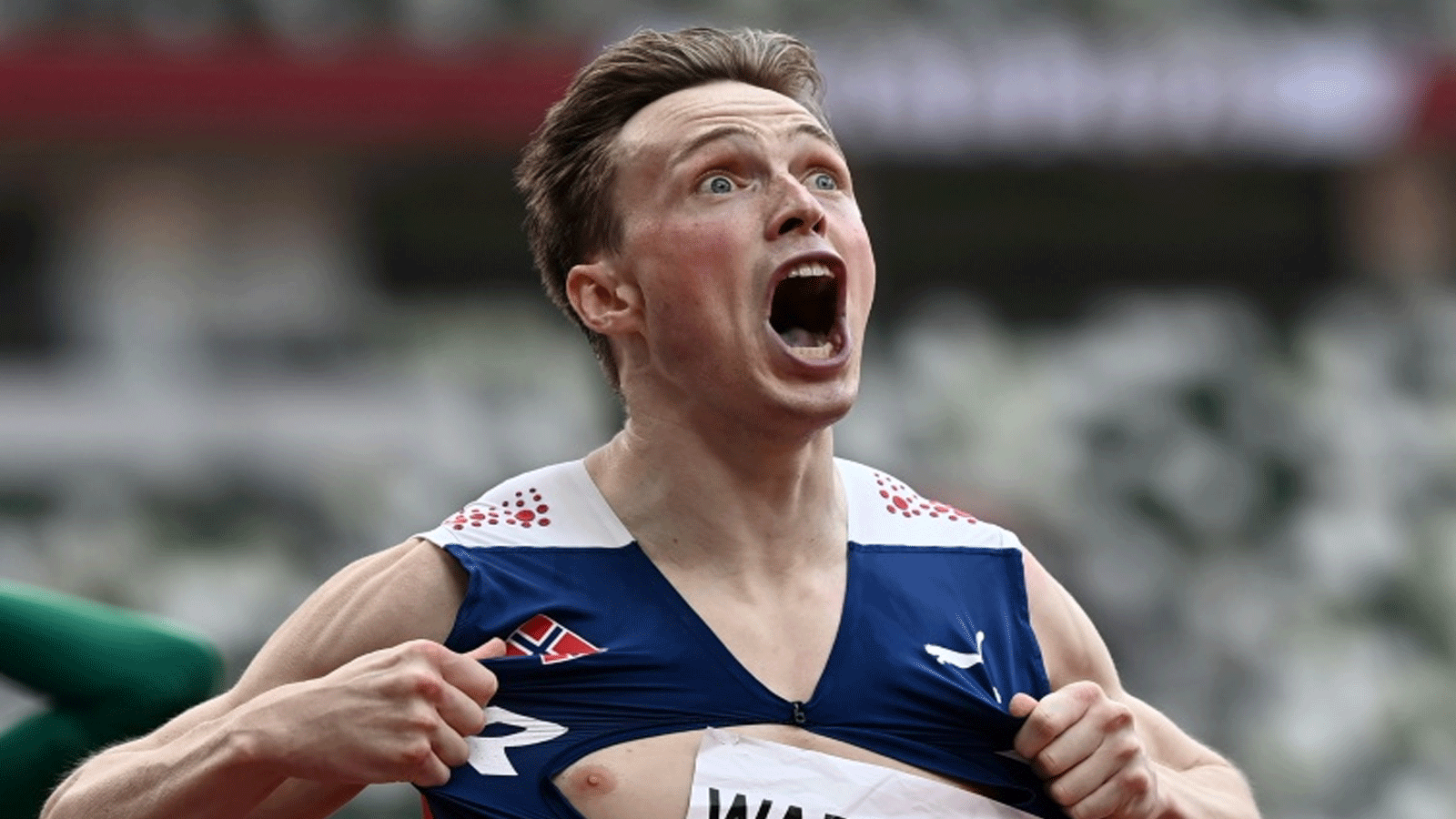 ردة فعل كارستن فارهولم بعد تحطيمه الرقم العالمي لسباق 400 م حواجز في أولمبياد طوكيو