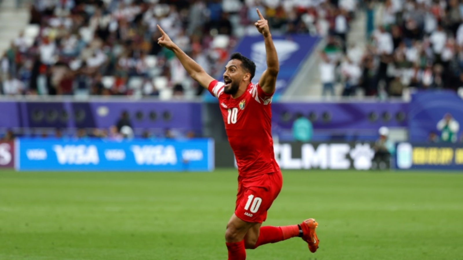 لاعب المنتخب الأردني موسى التعمري يحتفل بهدف الفوز في مرمى العراق (3-2) في الدور ثمن النهائي لنهائيات كأس آسيا في قطر في 29 كانون الثاني (يناير) 2024