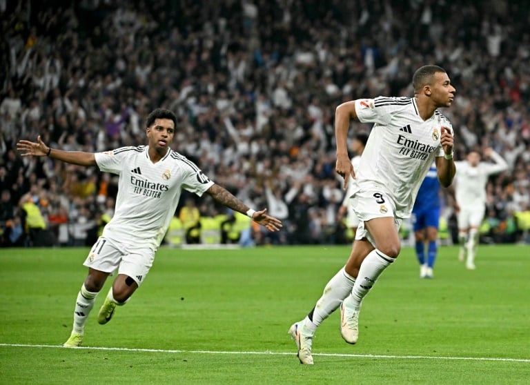 مهاجم ريال مدريد الدولي الفرنسي كيليان مبابي يحتفل بهدفه في مرمى خيتافي (2-0) في الدوري الاسباني في مدريد في الاول من كانون الأول/ديسمبر 2024