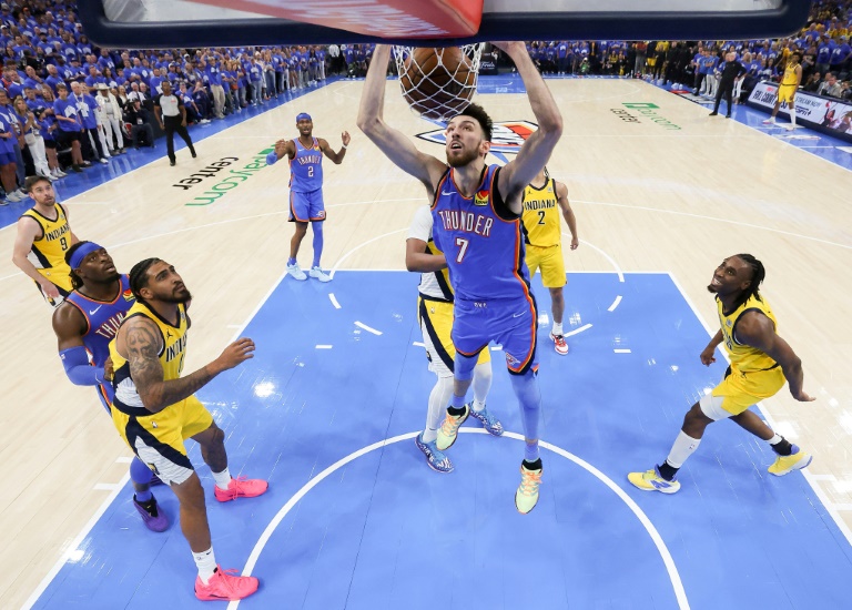Chet Holmgren of the Oklahoma City Thunder throws down a dunk in the Thunder's NBA title-clinching victory over the Indiana Pacers in game seven of the NBA Finals