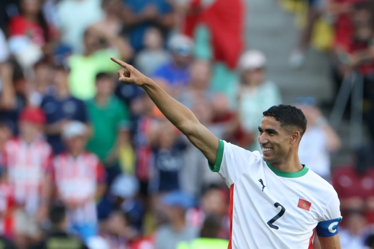 المغربي أشرف حكيمي يحتفل بتسجيله هدفا في مرمى مصر ضمن منافسات كرة القدم في أولمبياد باريس 2024. نانت، في 8 آب/أغسطس 2024