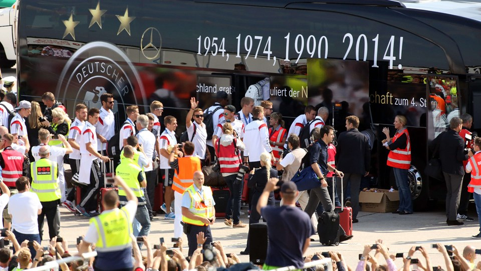 Real Madrid fans celebrate a late equaliser as the watch the Champions League final soccer match between Real Madrid and Atletico Madrid, taking place in Portugal, on a giant screen at the Santiago Bernabeu stadium in Madrid, Spain, Saturday, May 24, 2014