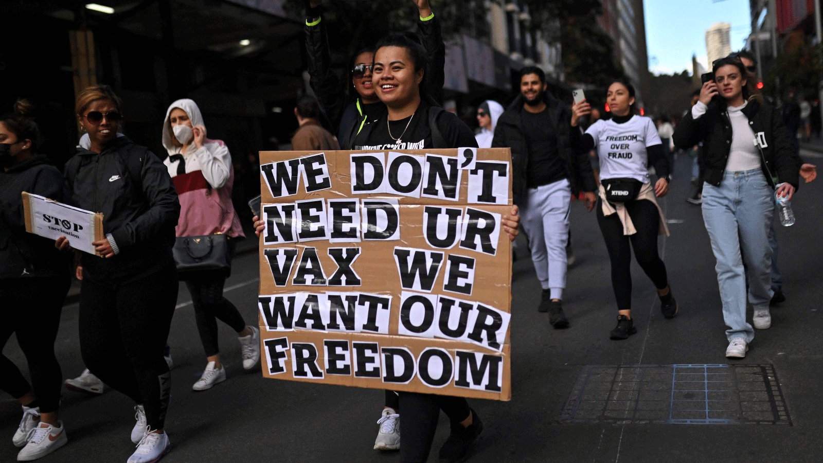 مئات المتظاهرين المناهضين للإغلاق ينزلون إلى الشوارع خلال تجمع حاشد في سيدني، أستراليا. 24 يوليو / تموز 2021.