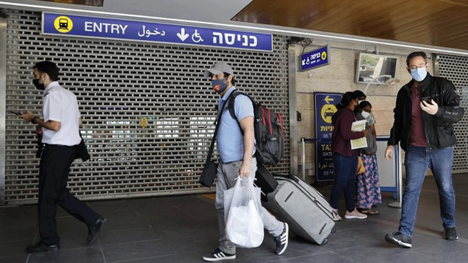 إسرائيل تعيد فرض ارتداء الكمامة في الأماكن العامة