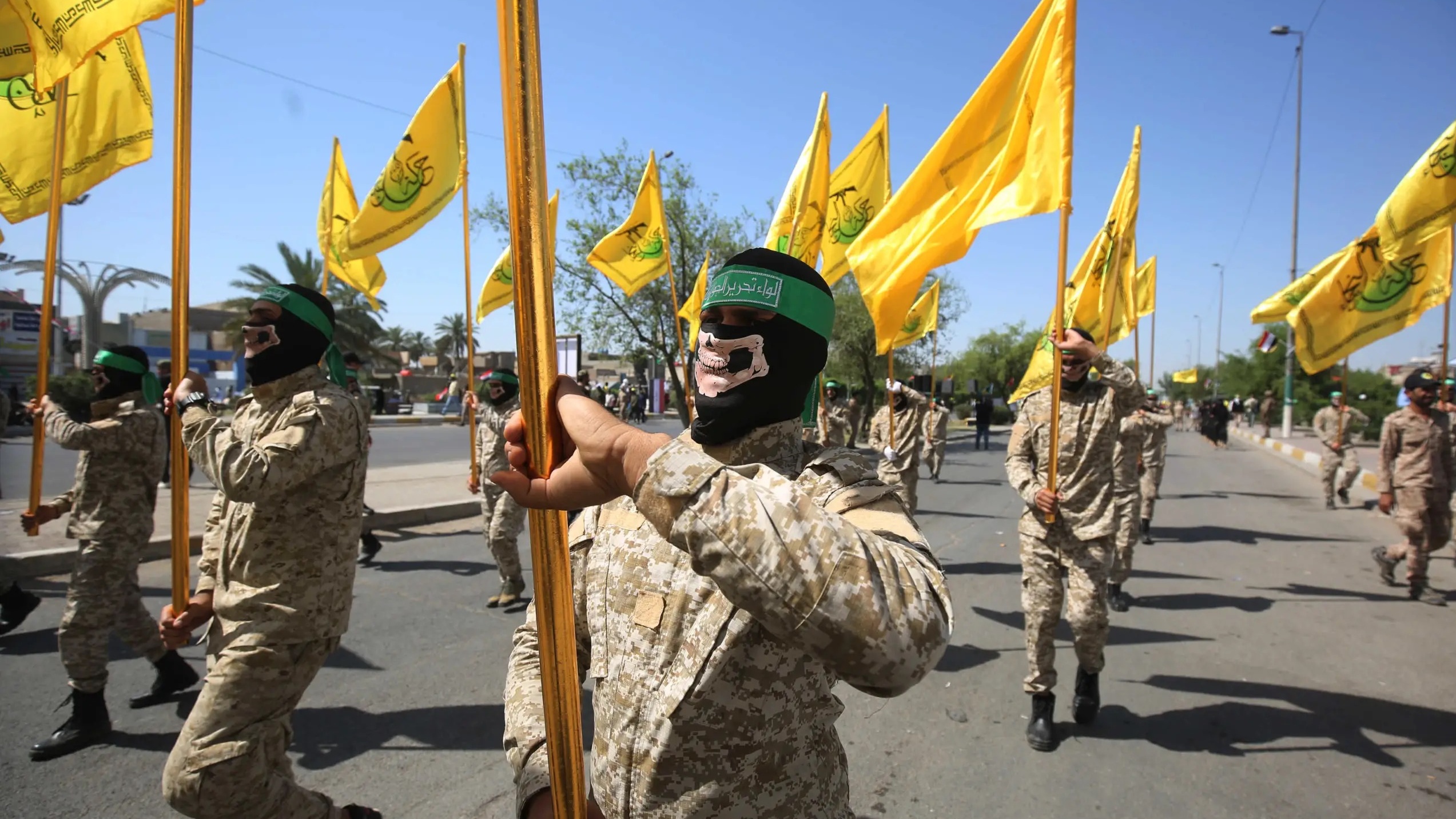 مقاتلون من حركة النجباء الشيعية الموالية لإيران خلال استعراض للقوة في بغداد، في 31 أيار (مايو) 2019