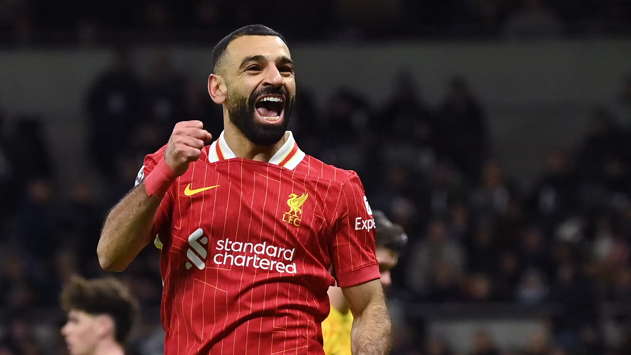 محمد صلاح يحتفل بعد تسجيله هدفاً في مرمى توتنهام في 22 كانون الأول (ديسمبر) في لندن