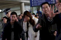 50 ألف دولار أول تعويض لعائلات ضحايا الطائرة الماليزية