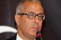 زيدان يعود إلى ليبيا ويعلن تأييد حفتر