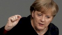  ميركل تستبعد أي شطب جديد للديون اليونانية