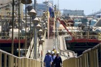 ستاندارد اند بورز تصنف الدين السيادي للعراق