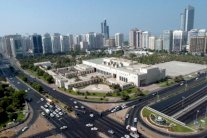 دمج أكبر شركتين استثماريتين في أبوظبي