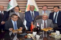 العراق يوقع مع الصين عقود تأهيل حقول نفط حدودية