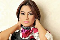 بسمة وهبة تروج للسياحة بإرتداء العلم المصري