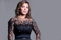 أصالة تعود من الرياض بثماني حقائب