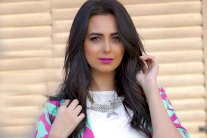 هبة مجدي ترتدي ملابس زوجها