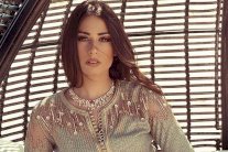 هبة طوجي تدعم المرأة بعملٍ فني