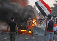 أيام من الاحتجاجات والمواجهات الدامية في العراق