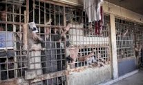 منظمات حقوقية تحذّر من وصول كوفيد-19 إلى سجون سوريا