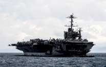 حاملة الطائرات الأميركية (هاري إس ترومان) تصطدم بسفينة تجارية في بورسعيد!