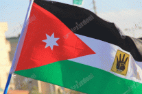 إخوان الأردن يشوّهون رمز الدولة بشعار (رابعة) 