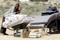 العاهل الأردني يدعو لمساعدة بلاده بتحمل أعباء اللاجئين السوريين 