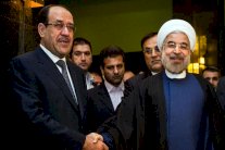 روحاني: نعمل مع العراق لحل سلمي ينهي الأزمة السورية 