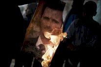 الجربا: تلقينا ضمانات أن لا مستقبل للأسد في سوريا 