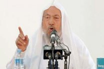 قرضاوي يتوعد