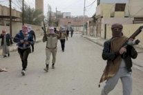 مسلحون يواصلون السيطرة على مناطق في الأنبار