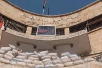 النظام السوري والمعارضة يتسابقان للسيطرة على سجن حلب