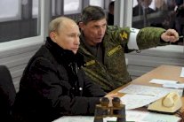 بوتين امر القوات التي تجري مناورات بالعودة الى قواعدها 