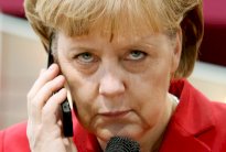 ميركل واوباما يهددان موسكو ب