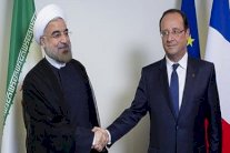 هولاند لروحاني: