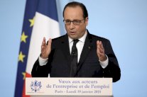 الرئيس الفرنسي يشيد بالملك عبدالله