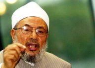 القرضاوي يدعو الى تظاهرات سلمية ضد شارلي ايبدو