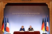 هولاند وميركل لبوتين: إضرب داعش فقط !