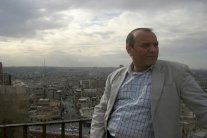 معارضون سوريون: اعتداءات باريس تخدم النظام