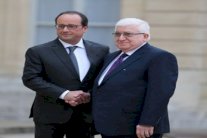 هولاند لمعصوم: سنوسع دعمنا العسكري لبلدكم